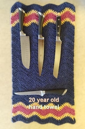 Hand Towel with Knives on it
